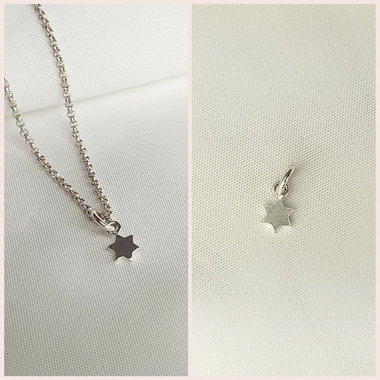 Losse zilveren sterretjes hanger voor aan een ketting. Handgemaakte zilveren sterretje bedel.