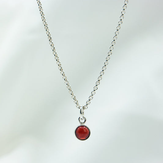 Zilveren meisjes ketting | Granaat (Ram)