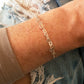 Zilveren armband met dubbele rij hartjes.